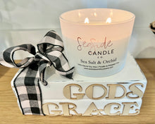 Load image into Gallery viewer, Let the delicate fragrance of Sea Salt and Orchid soy candle fill your home with the calming ambiance of the ocean as soft waves of fresh sea salt and blossoming orchid invite tranquility and grace to any space.