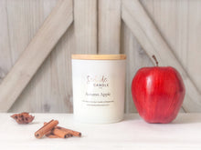 Load image into Gallery viewer, Our Apple Harvest is a true, ripe apple fragrance combined with bright fruit notes and just a touch of spice. It has year-round appeal but is especially nice around apple picking time. Apple Harvest may be the apple scent you didn't know you needed, but can't live without. This fragrance is infused with natural essential oils, including cinnamon, nutmeg, clove, orange, and cedarwood.