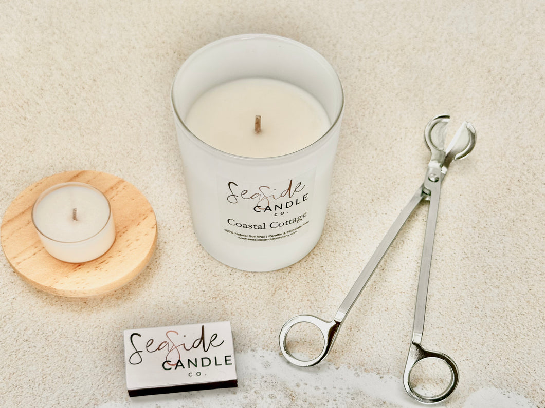 ✨ Introducing Our First Ever Candle Bundle – Coastal Cottage 🌊
Looking for the perfect way to treat yourself or gift someone special?
Our thoughtfully priced Coastal Cottage Bundle is a curated candle experience that brings elegance, fragrance, and function together in one beautiful set.

🕯️ Choose from 3 candle sizes
✂️ Select a black or silver wick trimmer
🔥 Includes a chic matchbook + surprise tealight in a different scent
🌊 Light our Coastal Cottage candle and let its soothing fragrance transport 
