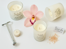 Load image into Gallery viewer, Let the delicate fragrance of Sea Salt and Orchid soy candle fill your home with the calming ambiance of the ocean as soft waves of fresh sea salt and blossoming orchid invite tranquility and grace to any space.