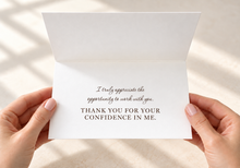 Load image into Gallery viewer, Open white greeting card held in hands, reading “I truly appreciate the opportunity to work with you. Thank you for your confidence in me.