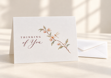 Load image into Gallery viewer, Thinking of You greeting card featuring a delicate botanical stem and dragonfly, with a white envelope.